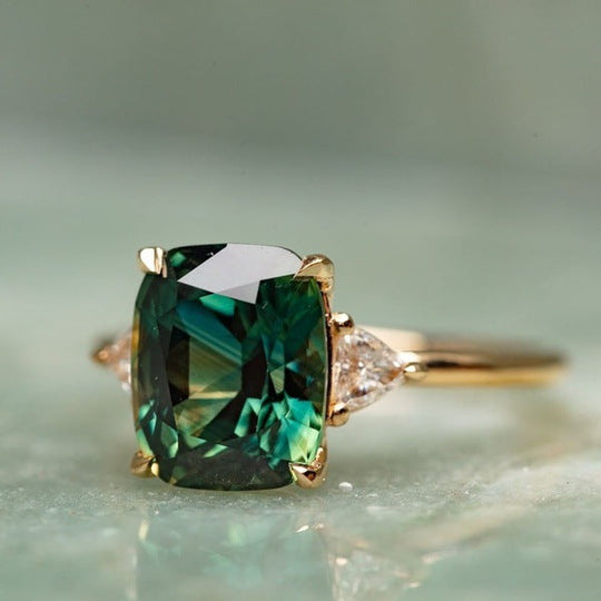 Gold Emerald Solitaire Ring